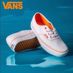 orange and white vans